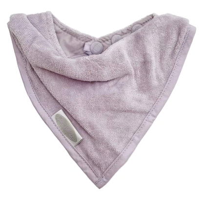 Silly Billyz Towel Bandana Bib shown in a soft lavender velour towelling fabric with a triangular bandana shape and neat stitched edging.