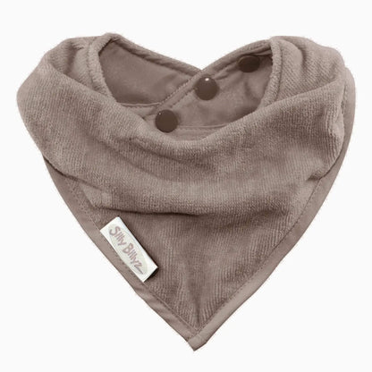 A Silly Billyz Towel Bandana Bib in taupe shown laid flat, shaped into a soft triangular drape with a towelling front, smooth backing and adjustable poppers.