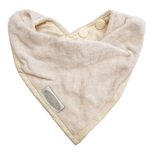 Silly Billyz Towel Bandana Bib in White Sand, featuring soft velour towelling with a neutral cream waterproof backing and adjustable pop stud closure.