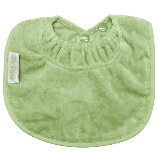 A small sage green towelling bib with a gathered neckline, rounded edges and two snap fasteners at the back.