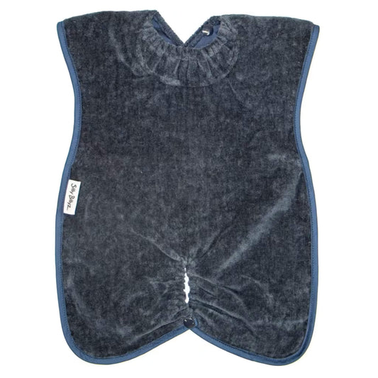 Silly Billyz Highchair Hugger Towel Bib in Navy, showing a soft towelling bib with elasticated neck opening, popper fastening at the back, and a gathered base designed to catch dropped food during highchair meals.