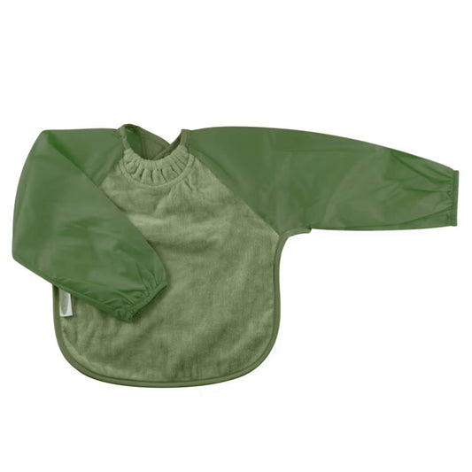 Silly Billyz Towel Long Sleeve Bib in olive green, shown laid flat with an absorbent cotton towelling front, full-length water-resistant sleeves with elasticated cuffs, a gathered neckline, and a back snap closure.
