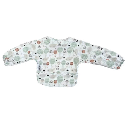 Silly Billyz long sleeve wipe-clean bib with Floating Whales design. Full coverage, adjustable fit, and waterproof protection for mess-free mealtimes.