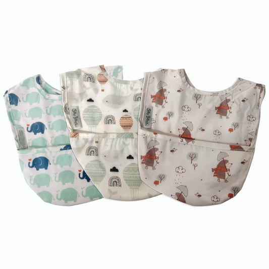 Silly Billyz wipe-clean pocket bibs 3-pack in neutral prints, featuring elephants, hot air balloons, and woodland creatures.