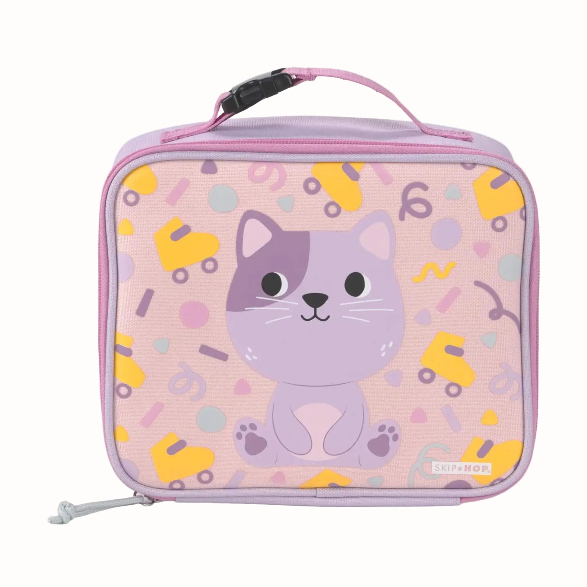 A Skip Hop kids' lunch bag in pastel pink and lavender, featuring a cute purple cat illustration and a pattern of yellow roller skates and colorful confetti, with a top carry handle and zipper closure.