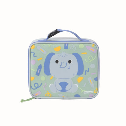 A square-shaped lunch bag with a light blue handle and zipper, featuring a cartoon elephant character on a pale green background with colourful doodles. The brand name 'SKIP HOP' is visible in the bottom right corner.
