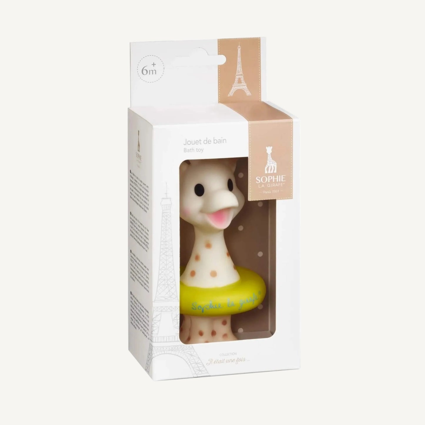 A boxed giraffe bath toy displayed in a white cardboard package with a clear front window and 6+ months marking.