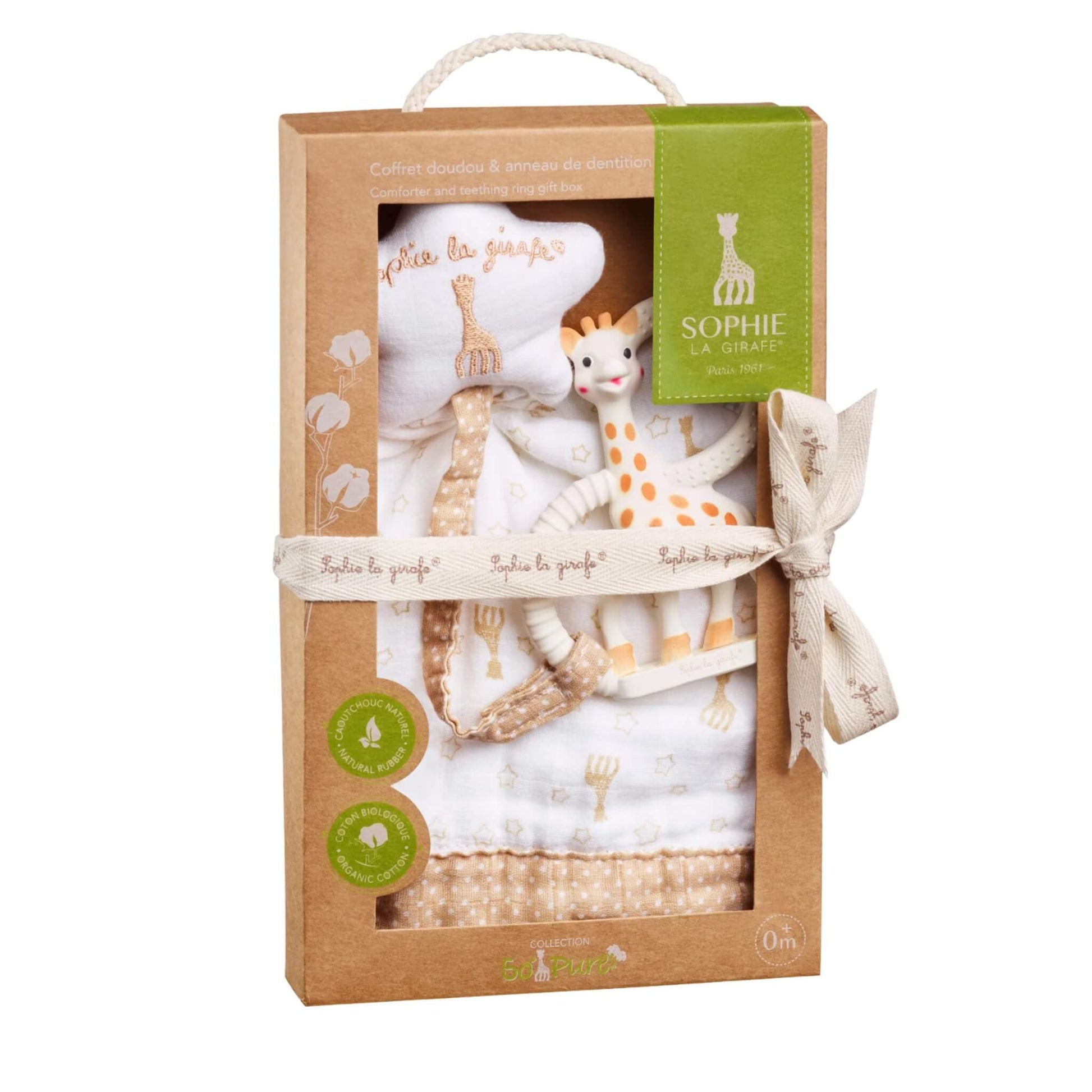 Sophie la Girafe So’Pure comforter and teething ring gift set displayed in a recyclable brown cardboard box with rope handle, fabric ribbon tie, and visible white comforter with matching giraffe teether.