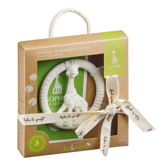 Sophie la Girafe So’Pure circle teething ring made from natural rubber, displayed in a recyclable brown cardboard gift box with rope handle and fabric ribbon.