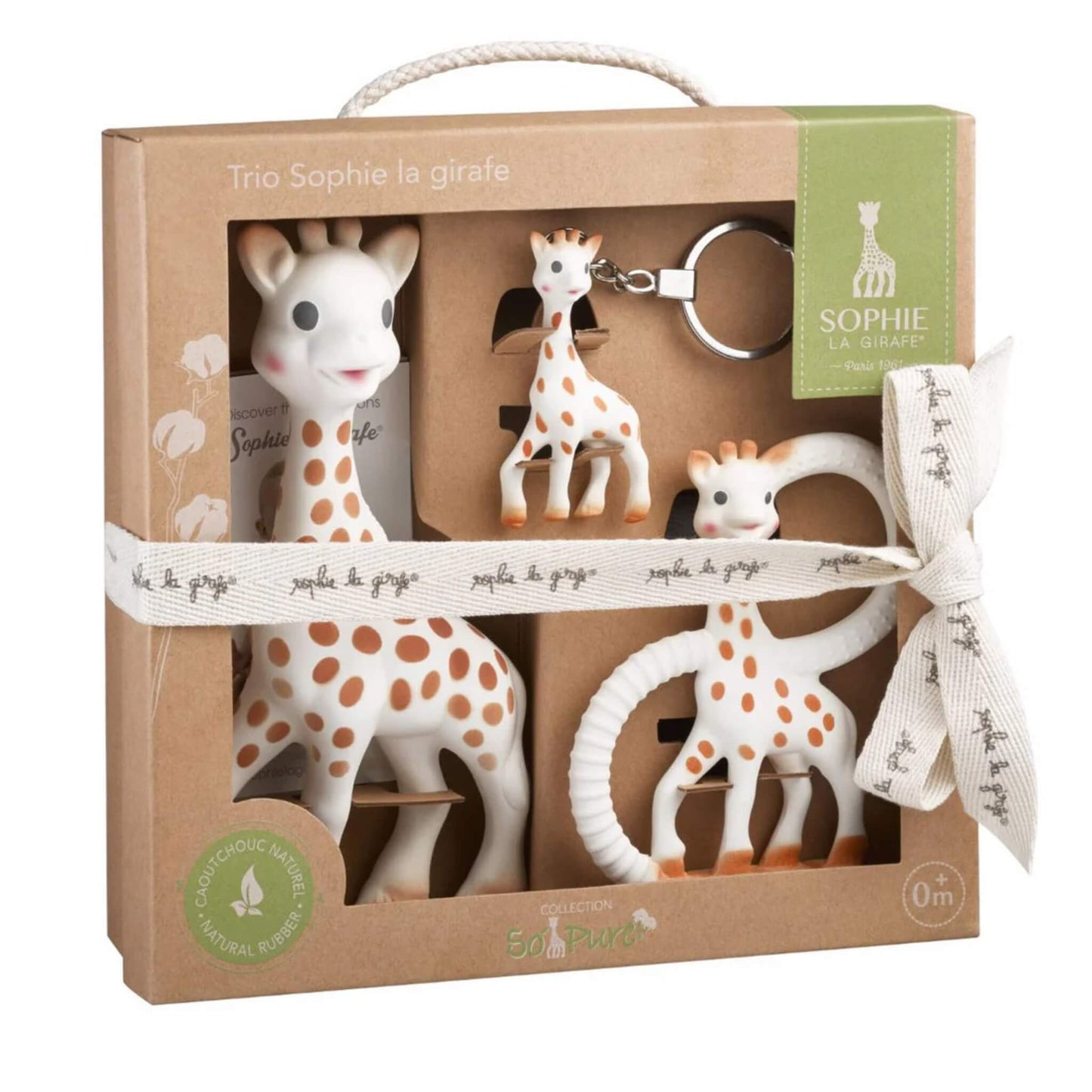 Sophie la Girafe Trio So’Pure natural rubber baby gift set displayed in a recyclable brown cardboard box with rope handle, ribbon tie, and three matching giraffe toys inside.