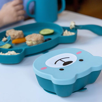 A blue "Boris Bear" character silicone baby feeding set with a bear-shaped plate, matching snack pot, cup, and cutlery, perfect for toddlers learning to self-feed.