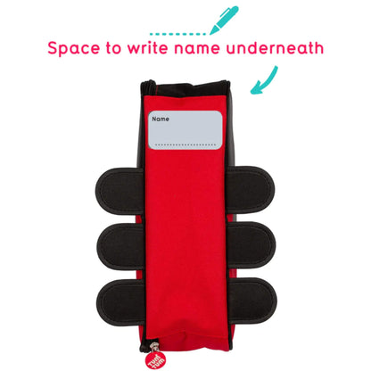 Underside view of a red insulated lunch bag showing a stitched name label panel and three padded fabric feet.