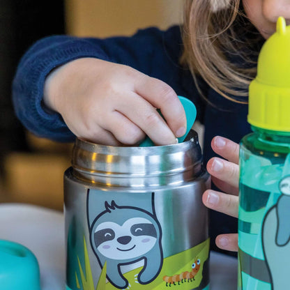 Child using an insulated food flask with sloth design, eating from it with a spoon, ideal for keeping kids' food hot or cold.