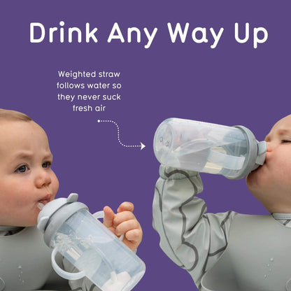 Two toddlers drinking at different angles as the weighted straw follows the water.