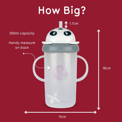A clear plastic baby tumbler with side handles, a gray lid, and a white lid featuring cartoon eyes, shown on a dark red background with measurement arrows and text indicating dimensions: 11 cm wide, 16 cm tall, 1.7 cm straw opening, 300 ml capacity, and a handy measure on the back.