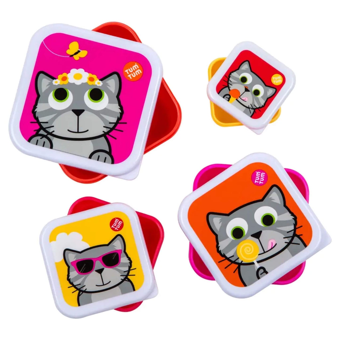 Four square children's lunch boxes with rounded corners, each featuring a colourful cartoon cat illustration on the lid. The boxes are shown in different colour combinations: red, yellow, orange, and pink, arranged on a plain white background.