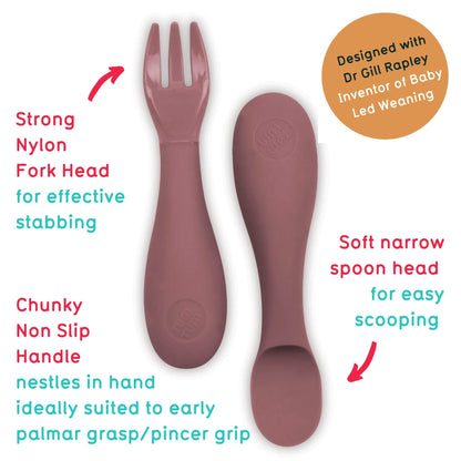 Toddler silicone cutlery set with pink spoon and fork, featuring a chunky non-slip handle and soft spoon head, ideal for baby-led weaning.