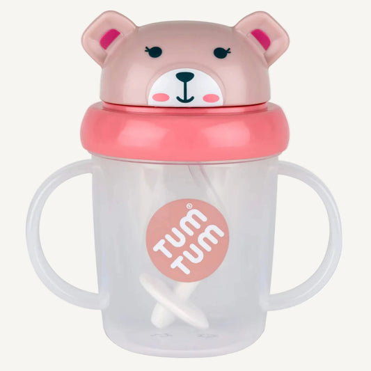 A clear handled sippy cup with a pink flip-top lid, bear character design, and an internal weighted straw visible inside the cup.