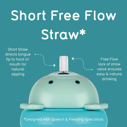 A blue baby feeding cup with a short straw, shown on a teal background with white text explaining the Short Free Flow design.
