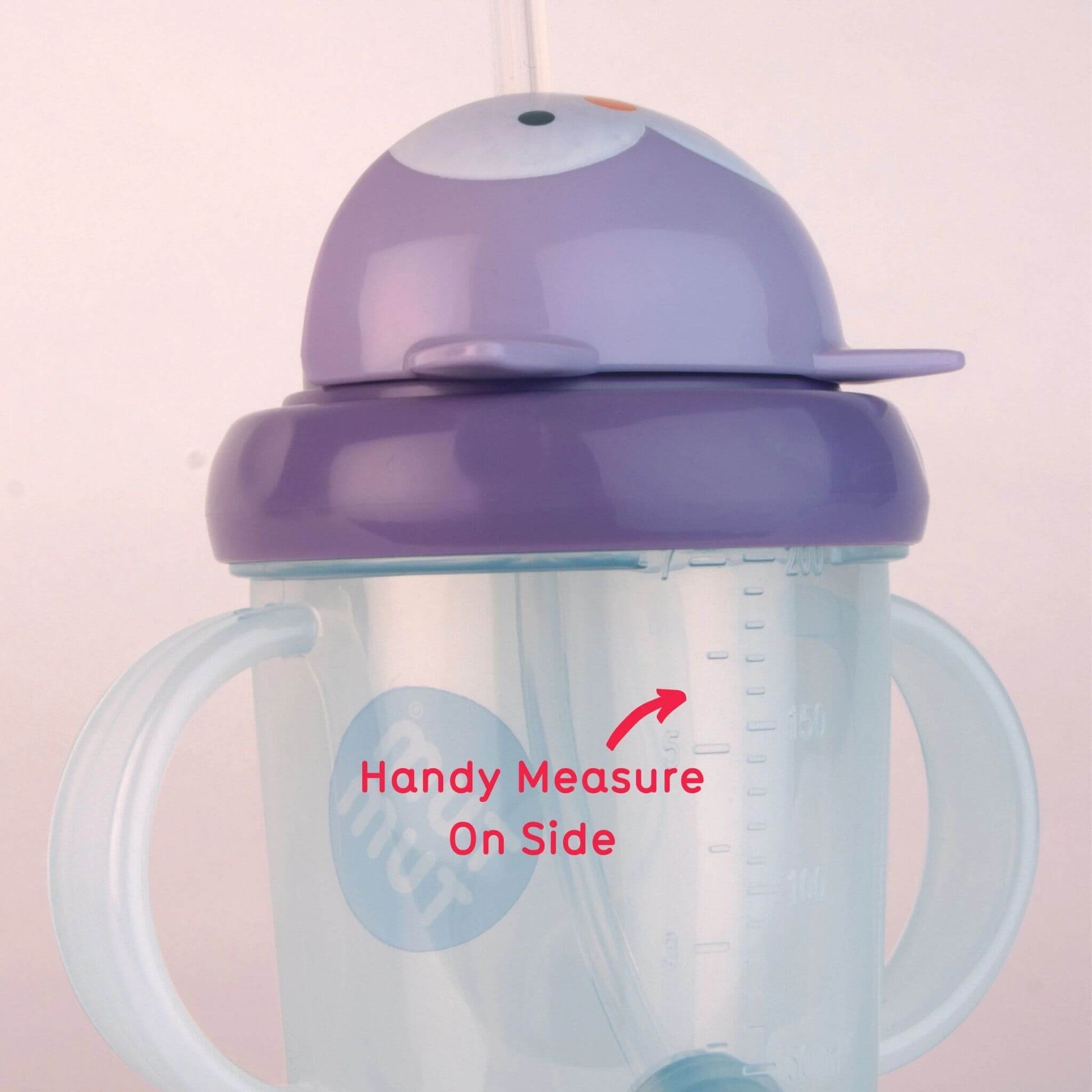 Close-up of a purple owl flip-top cup showing a clear measurement scale on the side with on-image text reading “Handy Measure On Side.”