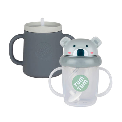 Tum Tum Tippy Up Cup and Trainer Cup bundle in the Kev Koala design, showing a grey silicone trainer cup alongside a clear sippy cup with a koala lid and side handles.