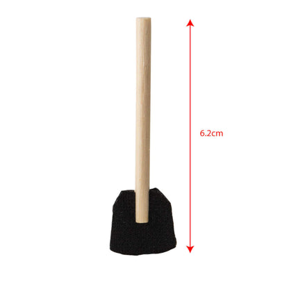 Close-up of the wooden shovel tool from the set, measuring 6.2cm in height with a fabric scoop and smooth wooden handle.