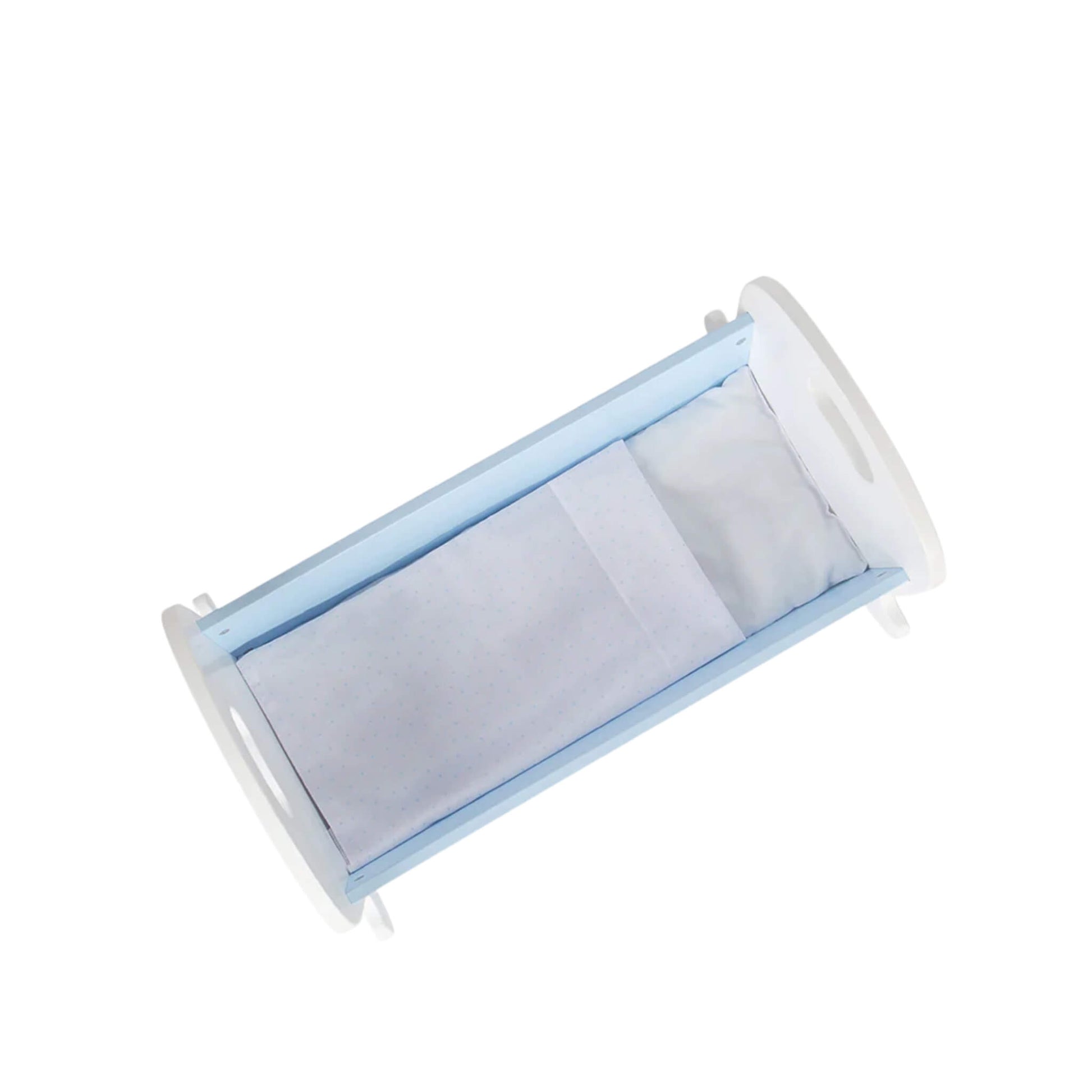 Top view of the Tidlo doll’s cradle with mattress, pillow and blanket neatly laid out inside.