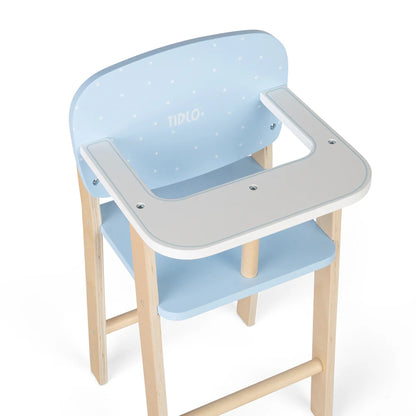 Overhead view of the Tidlo highchair with white feeding tray, blue polka dot back and matching seat panel.