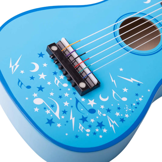 Close-up of the guitar body showing colourful nylon strings and a detailed pattern of stars, lightning bolts, and music notes.