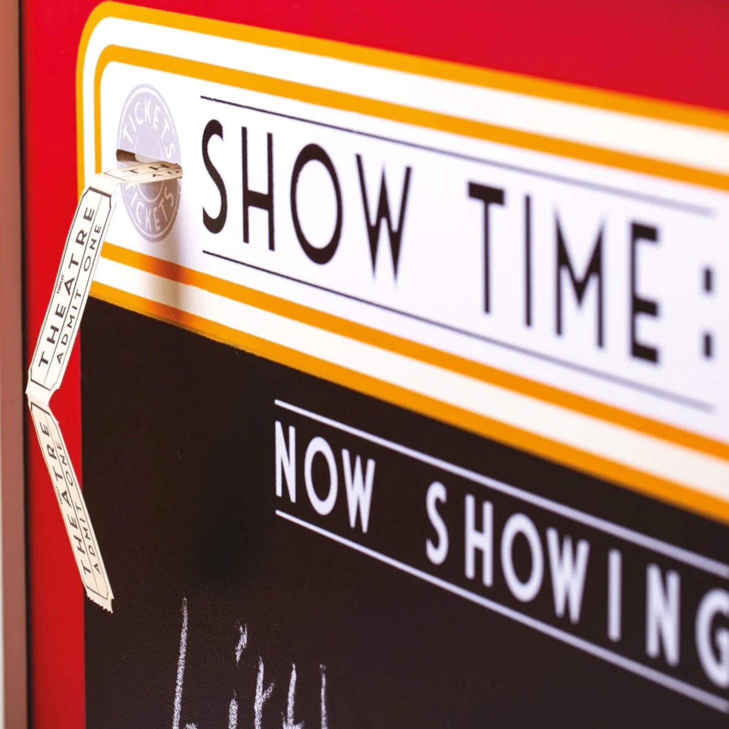 Close-up of the theatre signage with ‘Show Time: Now Showing’ printed above a chalkboard, highlighting the interchangeable display area.