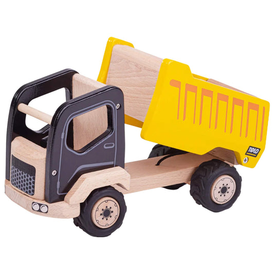 Tidlo Tipper Truck, a sturdy yellow and black wooden toy with a working tipper bed, open cab and chunky rubber wheels designed for construction-themed play.