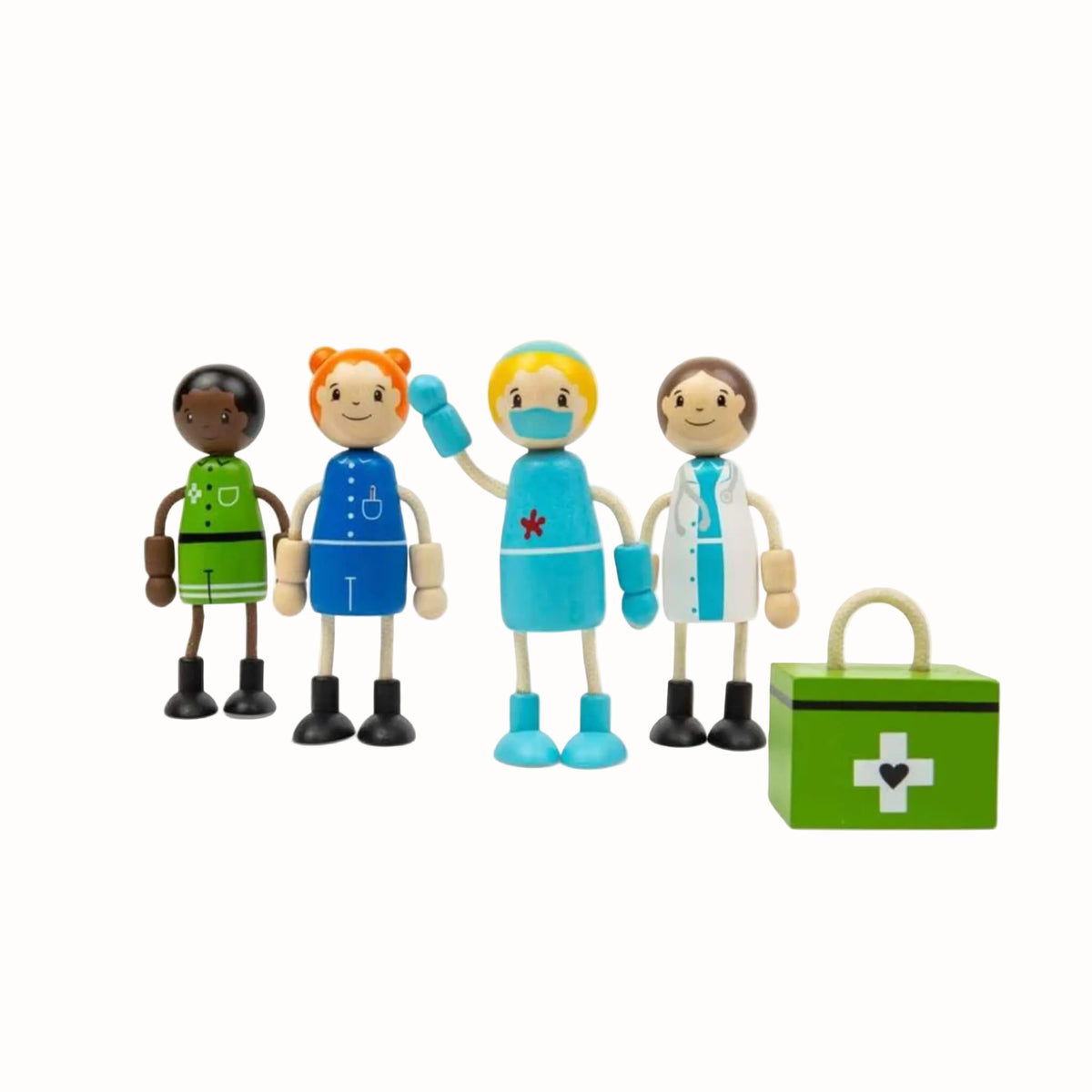 Four wooden healthcare figures standing beside a green first aid kit, including doctor, nurse, surgeon and paramedic.