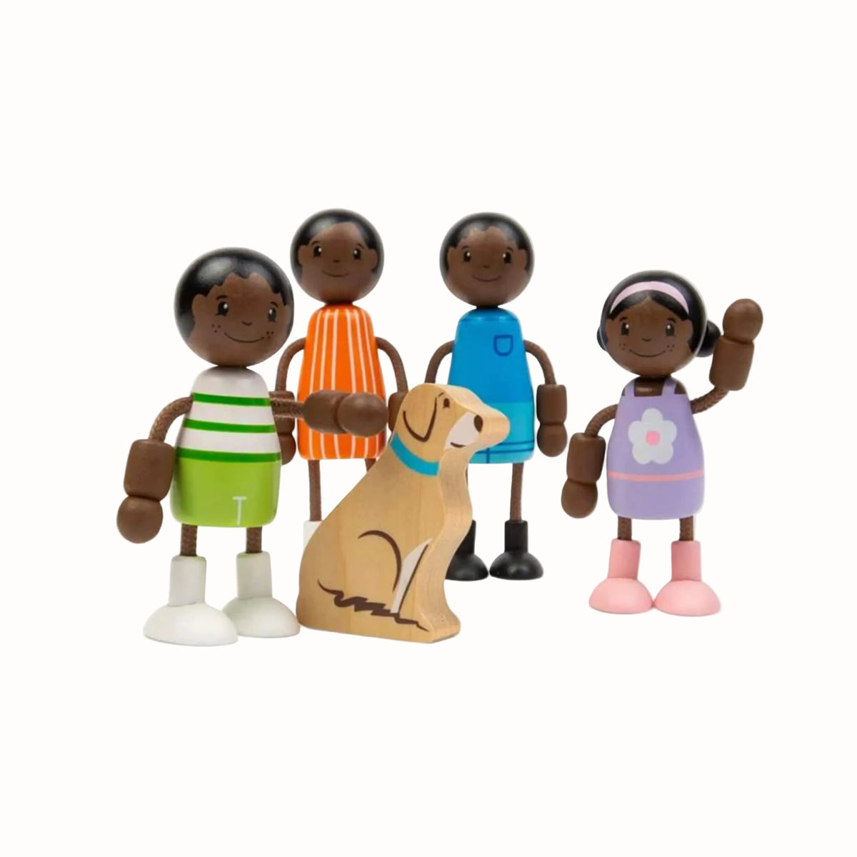 A wooden family of four with flexible arms and legs gathered around their pet dog.