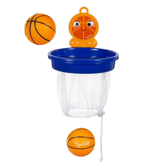 Tiger Tribe Bath Ball – Dunk Time bath toy shown with two orange basketballs, a blue hoop, and a white mesh net featuring a smiling basketball face.