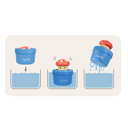 Simple three-step diagram showing how the toy is submerged, pops up, then sprinkles water when lifted.