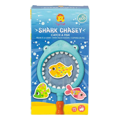 Front of the Tiger Tribe Shark Chasey retail box showing the shark-shaped net with a foam fish inside and playful ocean-themed graphics.