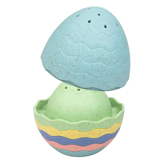 Tiger Tribe Stack & Pour ECO Bath Egg shown open with seven colourful stacking cups partially nested, each with water holes for pouring play.