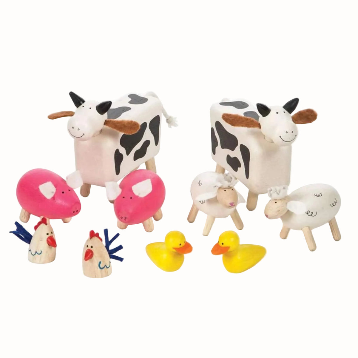 A wooden farm animal set with cows, pigs, sheep, chickens and yellow ducks.