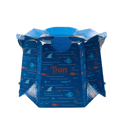 Blue disposable potty with fish print, displayed in an open position ready for use.