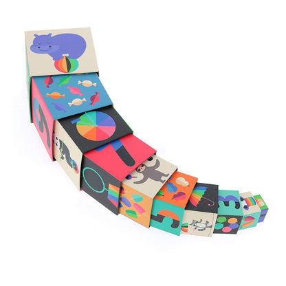 Ten illustrated stacking cubes laid out in a curved line from largest to smallest, showing different numbers, animals, and colourful patterns.