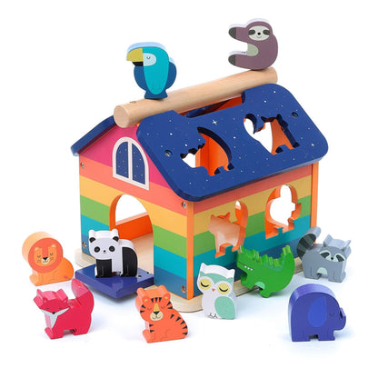 Vilac Andy Westface Shape Sorter wooden rainbow house with animal-shaped blocks arranged around it.