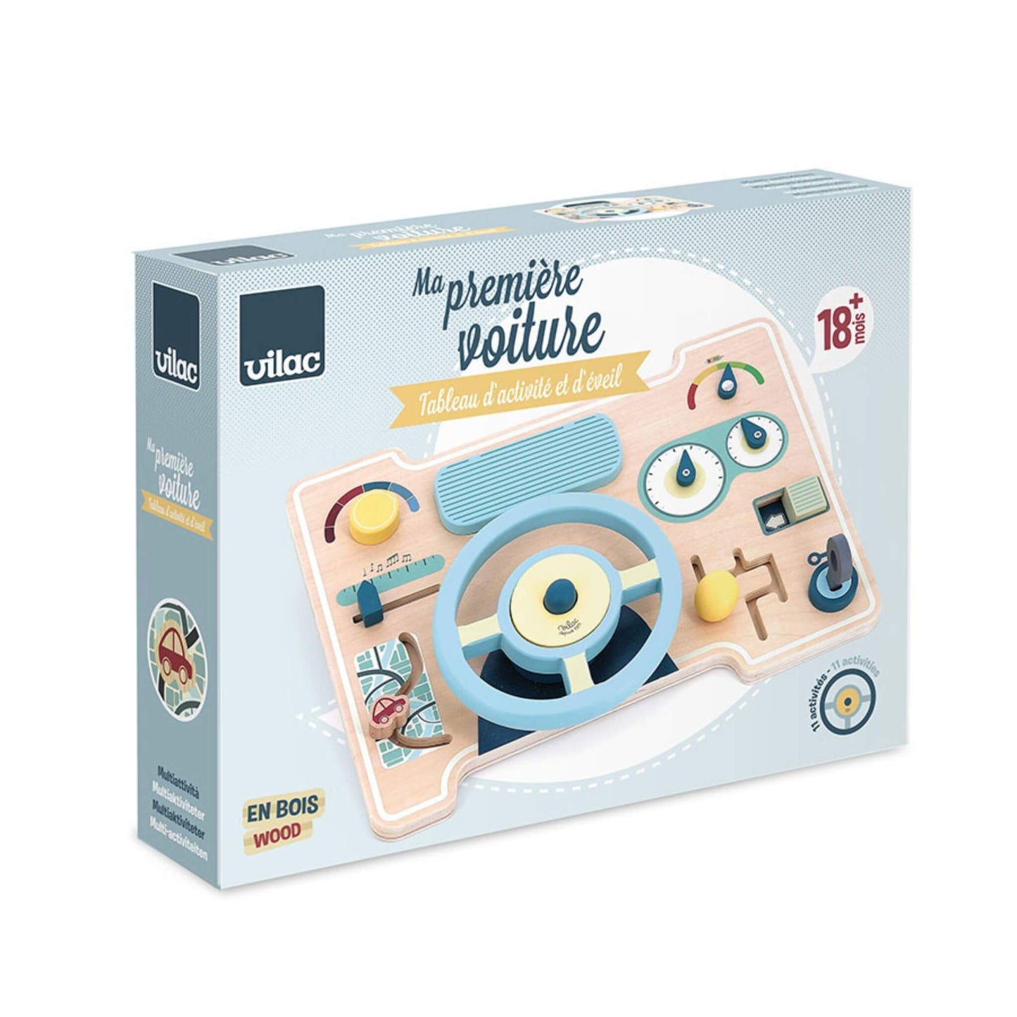 Close-up of boxed wooden dashboard toy with soft colour palette, showing steering wheel, sliders and rotating dials for sensory play.