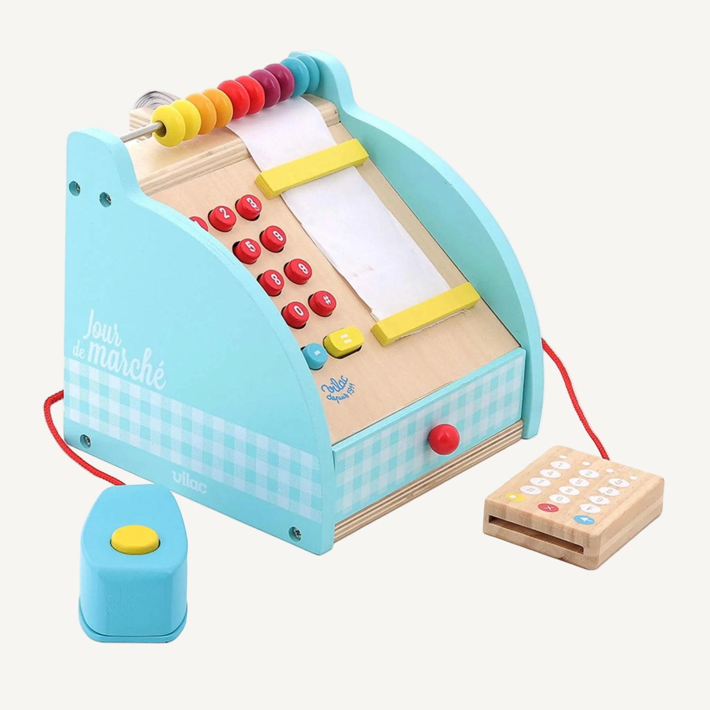 Side view of a wooden toy cash register with curved blue casing, bead abacus across the top, and red cord attached to a scanner block.