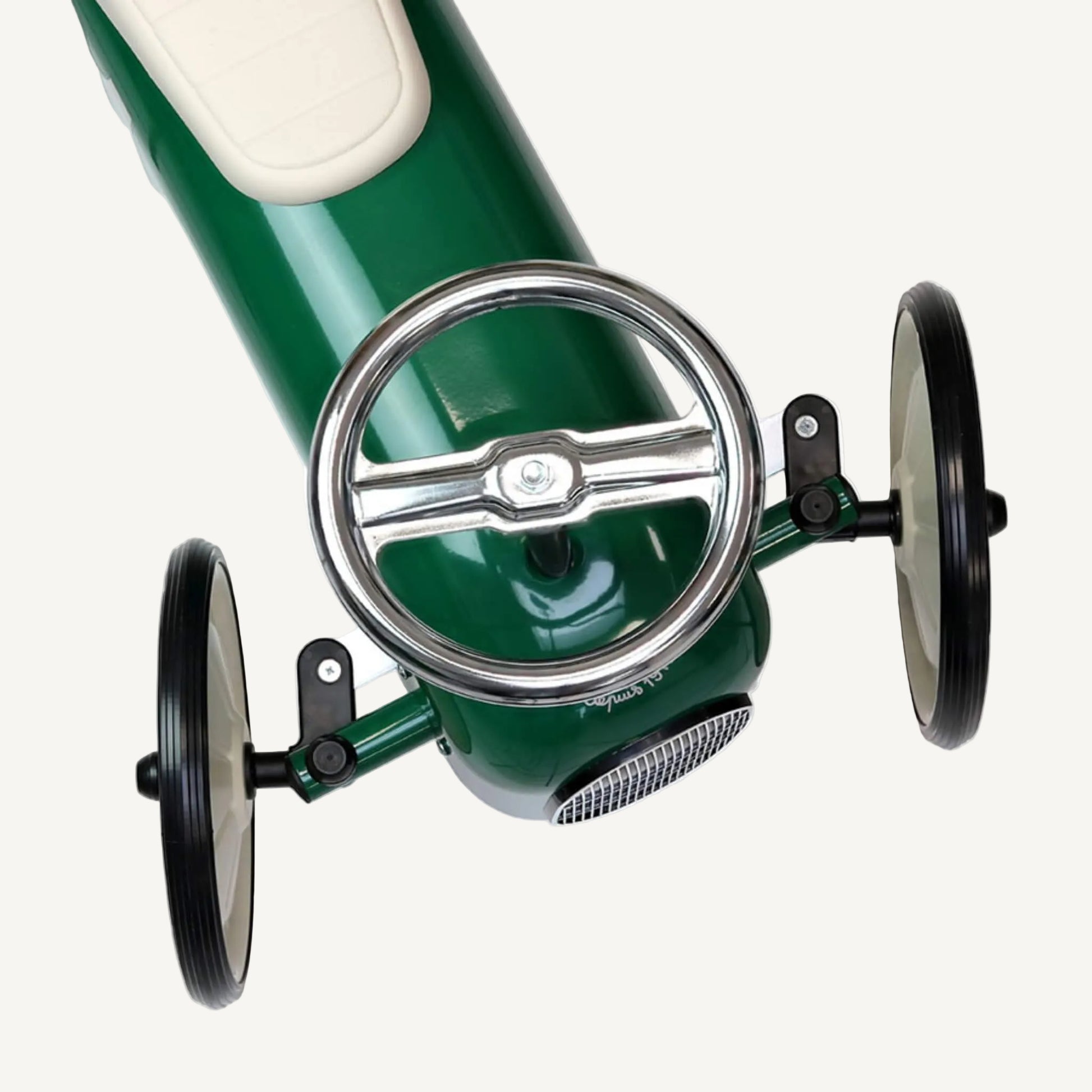 Angled view of ride-on car showing full shape, steering column and seat design from above.