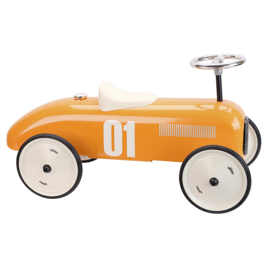 Vilac Classic Car Ride-On in orange, a vintage style metal ride-on toy with cream seat, chrome steering wheel, white number 01 and four cream wheels with black tyres.