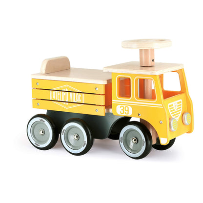 Vilac Construction Site Ride On Truck wooden toddler ride on in yellow with steering wheel, stable base and multiple wheels on a clean background.