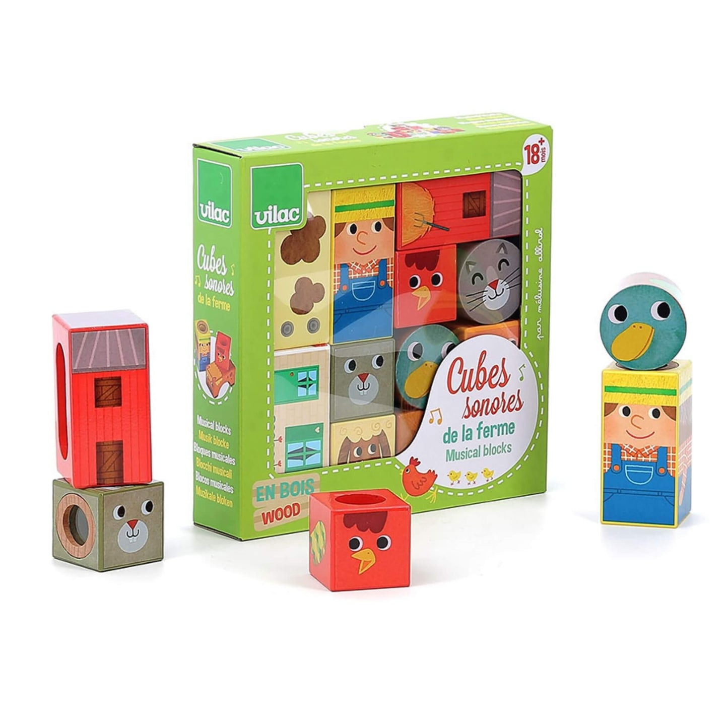 Wooden Farm Musical Blocks packaging shown with a green box displaying the illustrated cubes, alongside stacked blocks including a duck, farmer and barn.