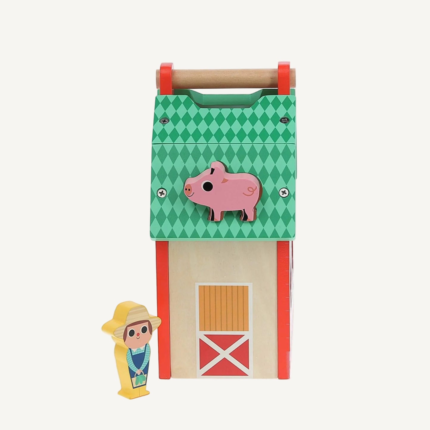 A wooden farm toy barn side panel with pig shape slot on green roof section and farmer figure standing beside the barn door.