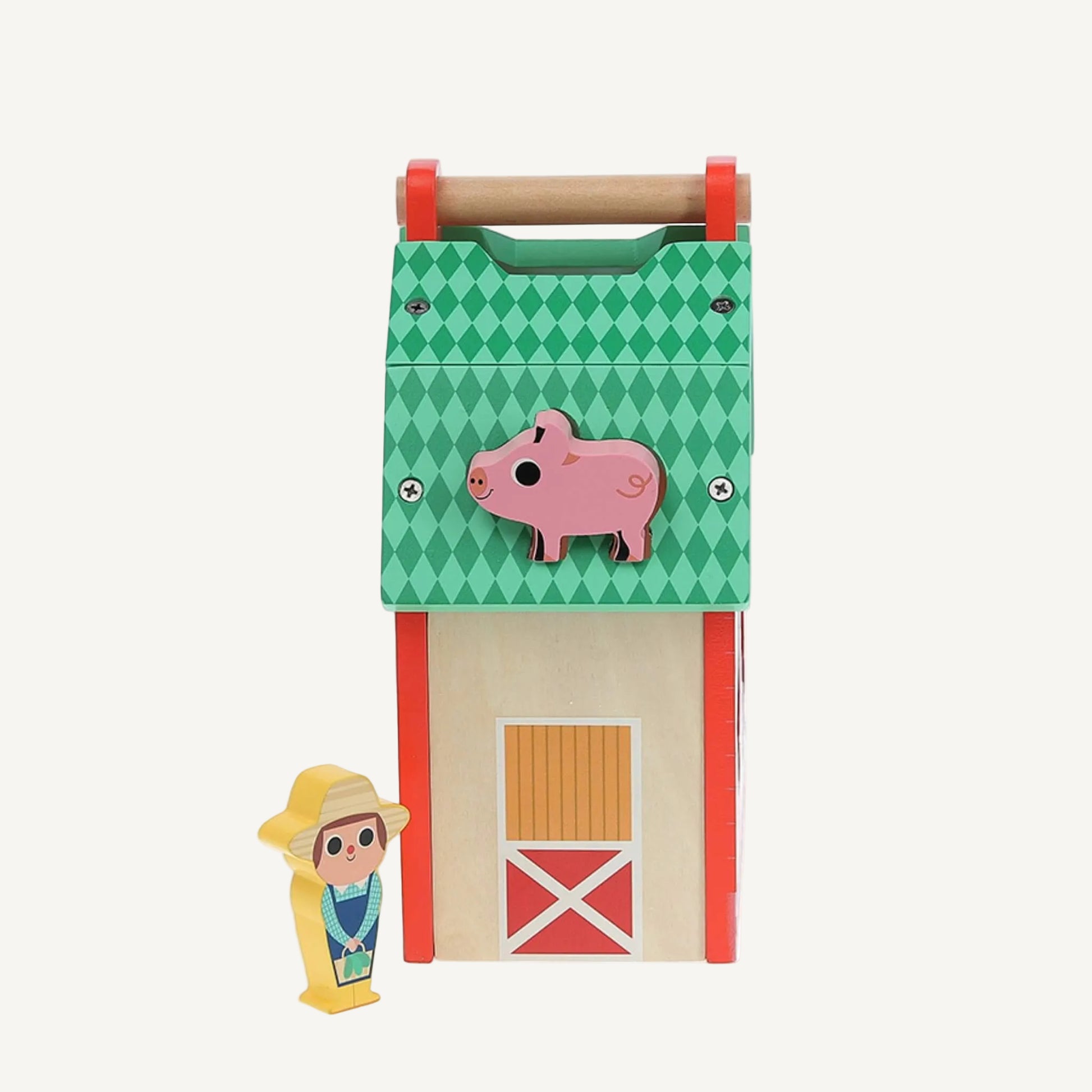 A wooden farm toy barn side panel with pig shape slot on green roof section and farmer figure standing beside the barn door.