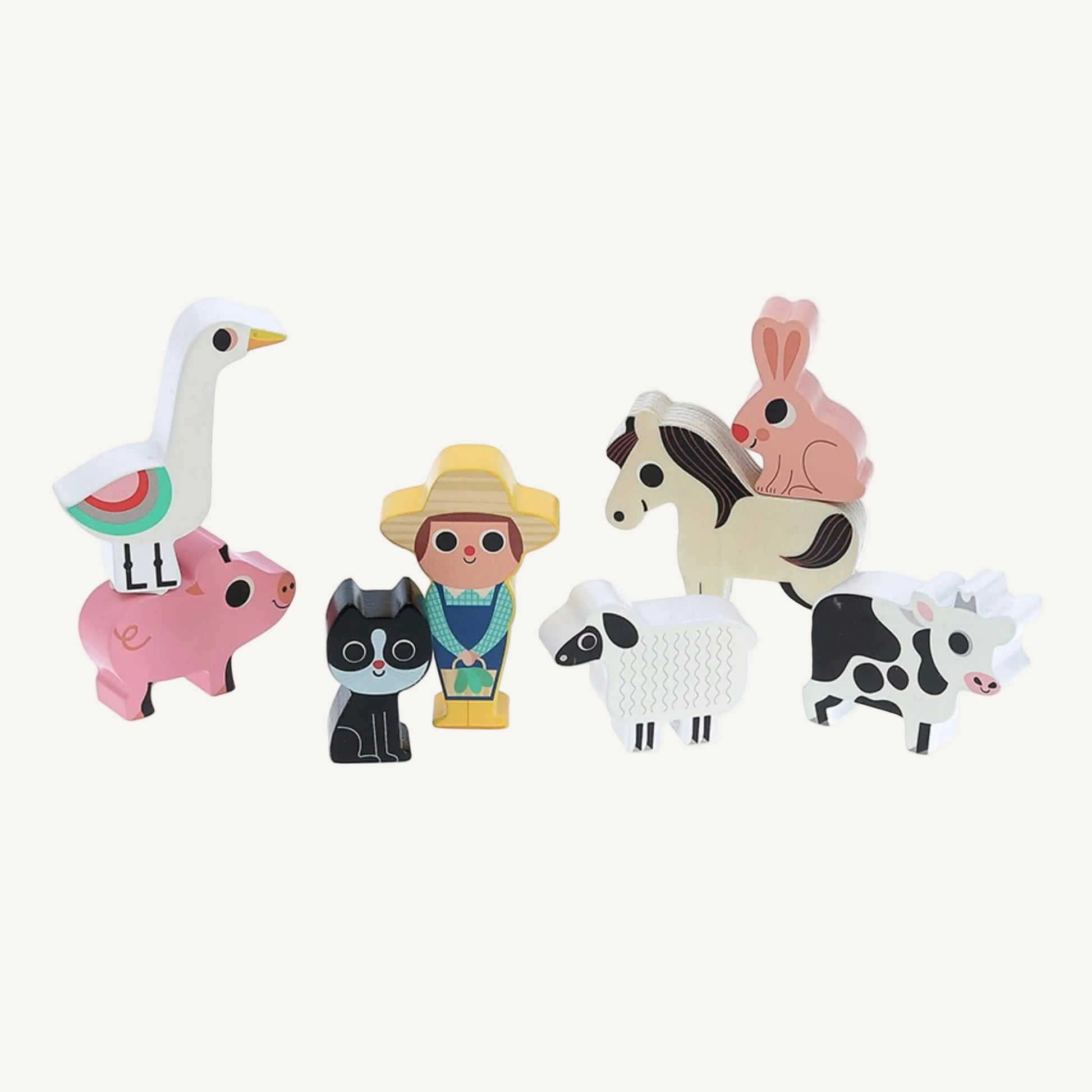 A set of wooden farm animal figures including goose, pig, cat, farmer, sheep, horse and cow arranged together on a plain background.
